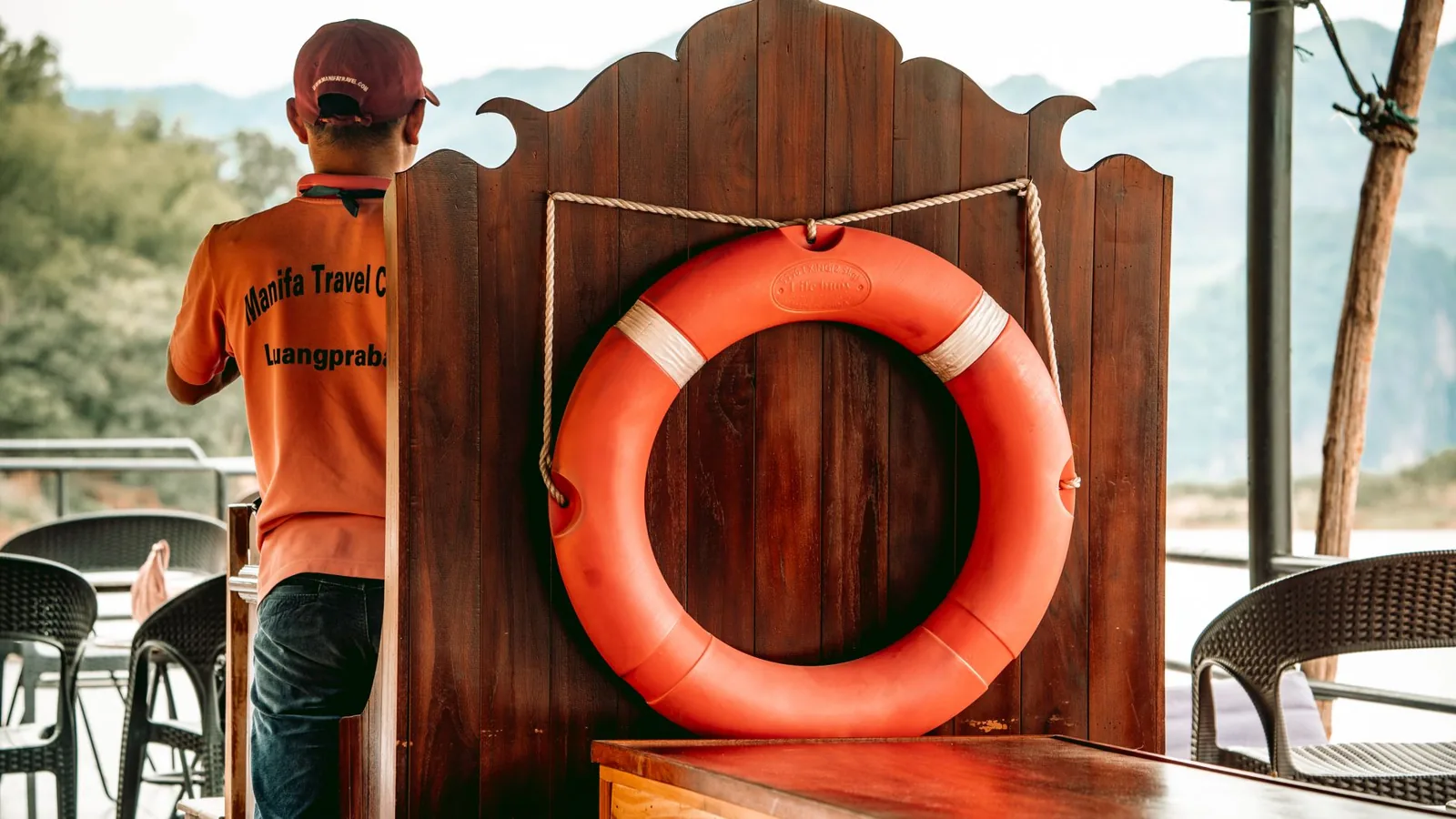 Traveler checking cruise insurance coverage before sailing