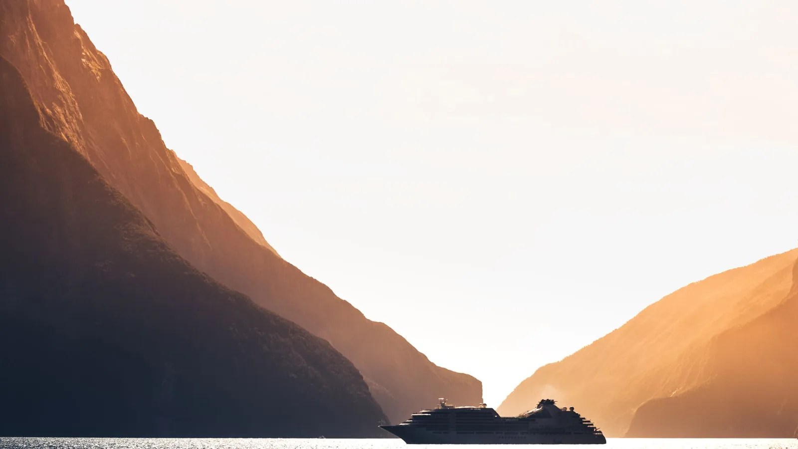 Cruise ships docked at a sunny port in the Pacific