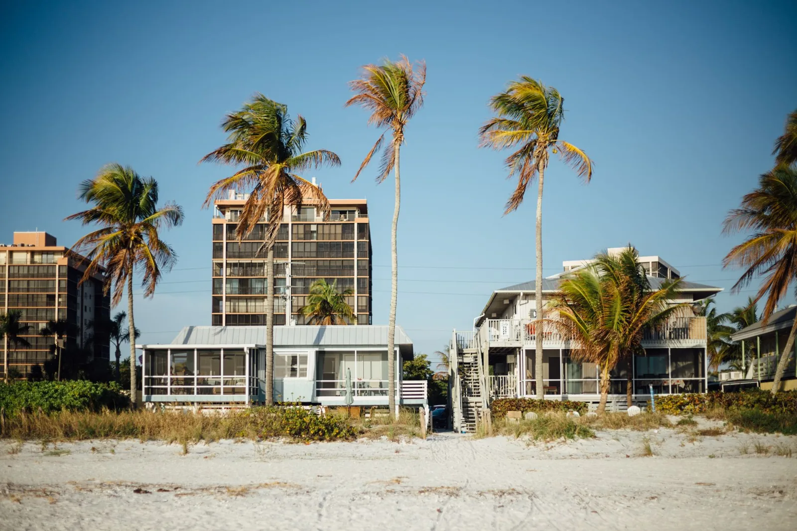 A family checking into a vacation home booked through a rental platform