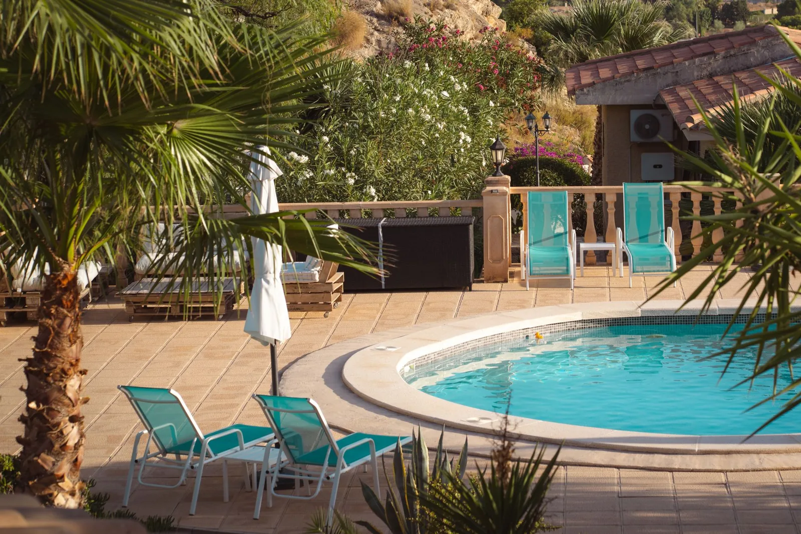 Vacation rental manager reviewing revenue and occupancy reports with an owner